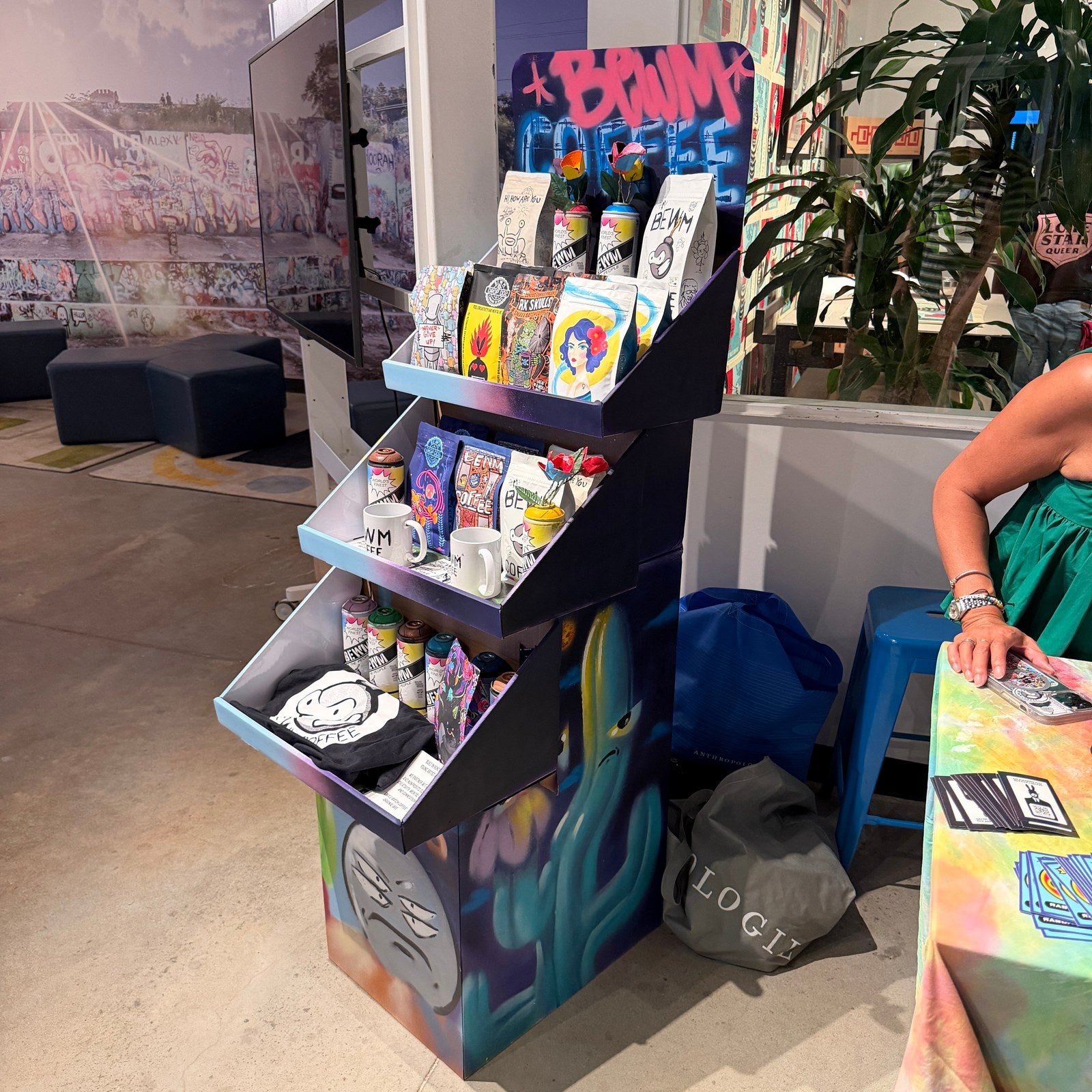 Artist-painted BEWM display stocked with coffee at HOPE Outdoor Gallery